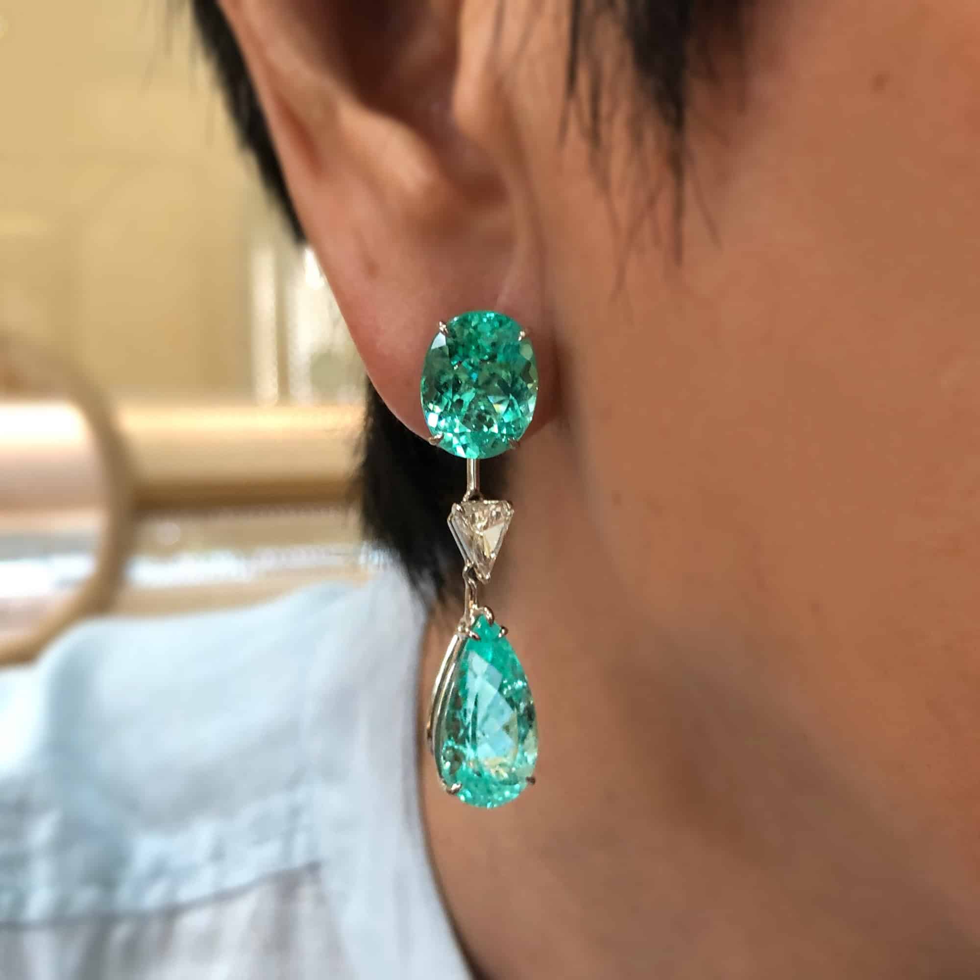 These earrings have paraibas with a total carat weight of over 26 carats. The quality and rarity of such large specimens lends them a high value.