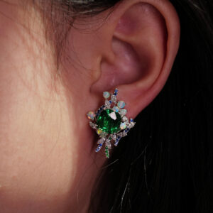 Our magical bespoke pair of earrings features Tsavorites, Opals and Diamonds.