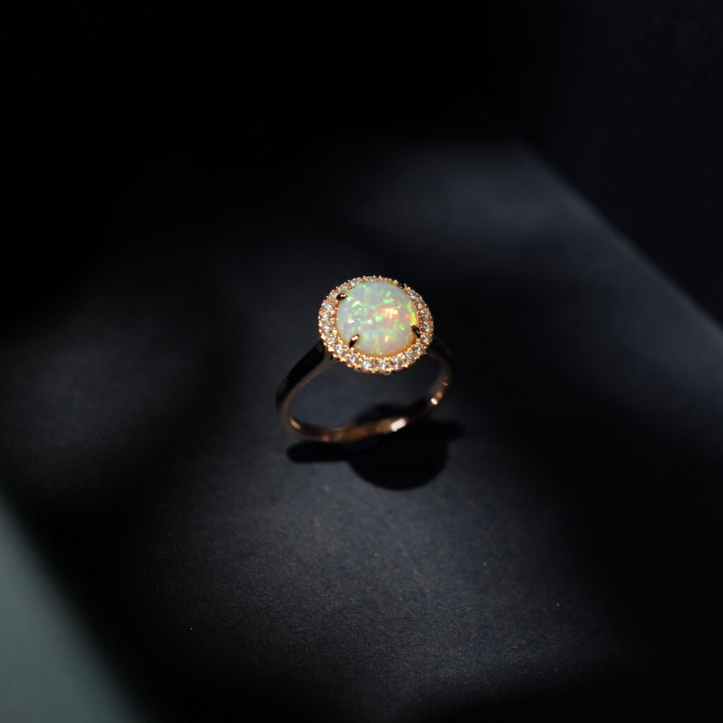 A scintillating spectacle for the senses: an almost surreal looking Opal lit up by a radiant halo to amplify it’s wonder.