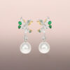 Pearl drop earrings with tapered baguette diamonds